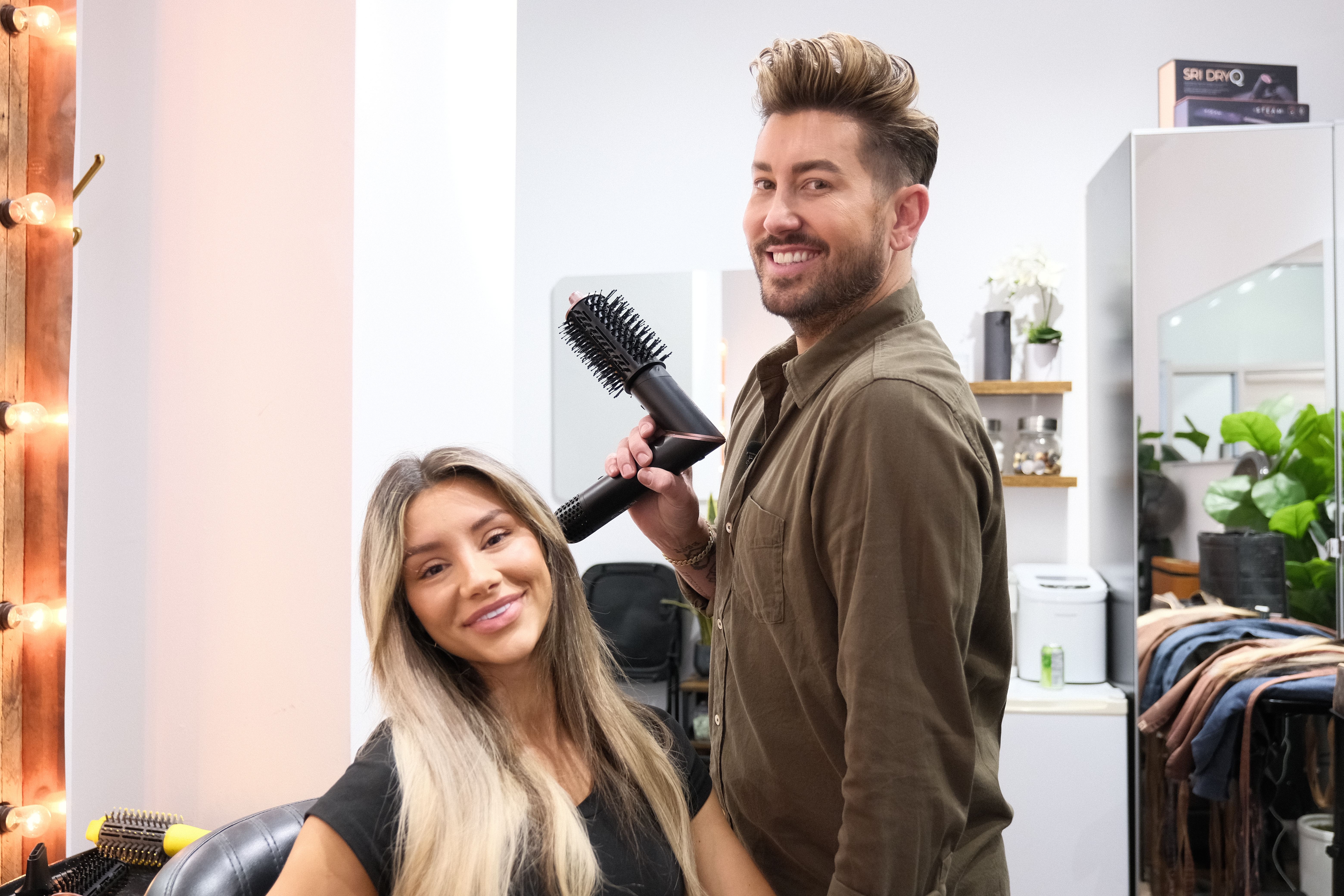 beausef dida doing a woman's hair